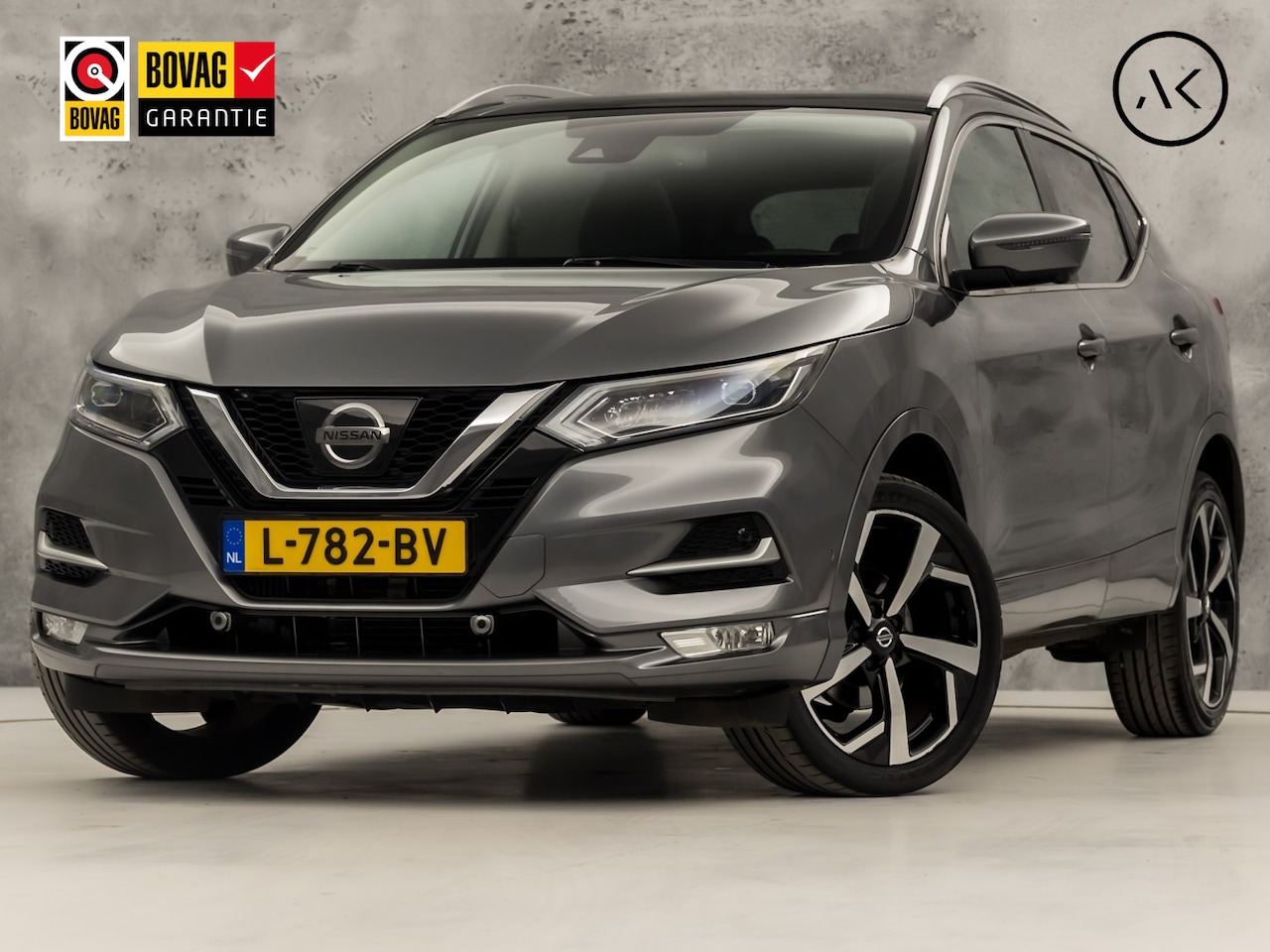 Nissan Qashqai - 1.2 Tekna Sport Automaat (PANORAMADAK, NAVIGATIE, 360 CAMERA, BOSE AUDIO, STOELVERWARMING, - AutoWereld.nl