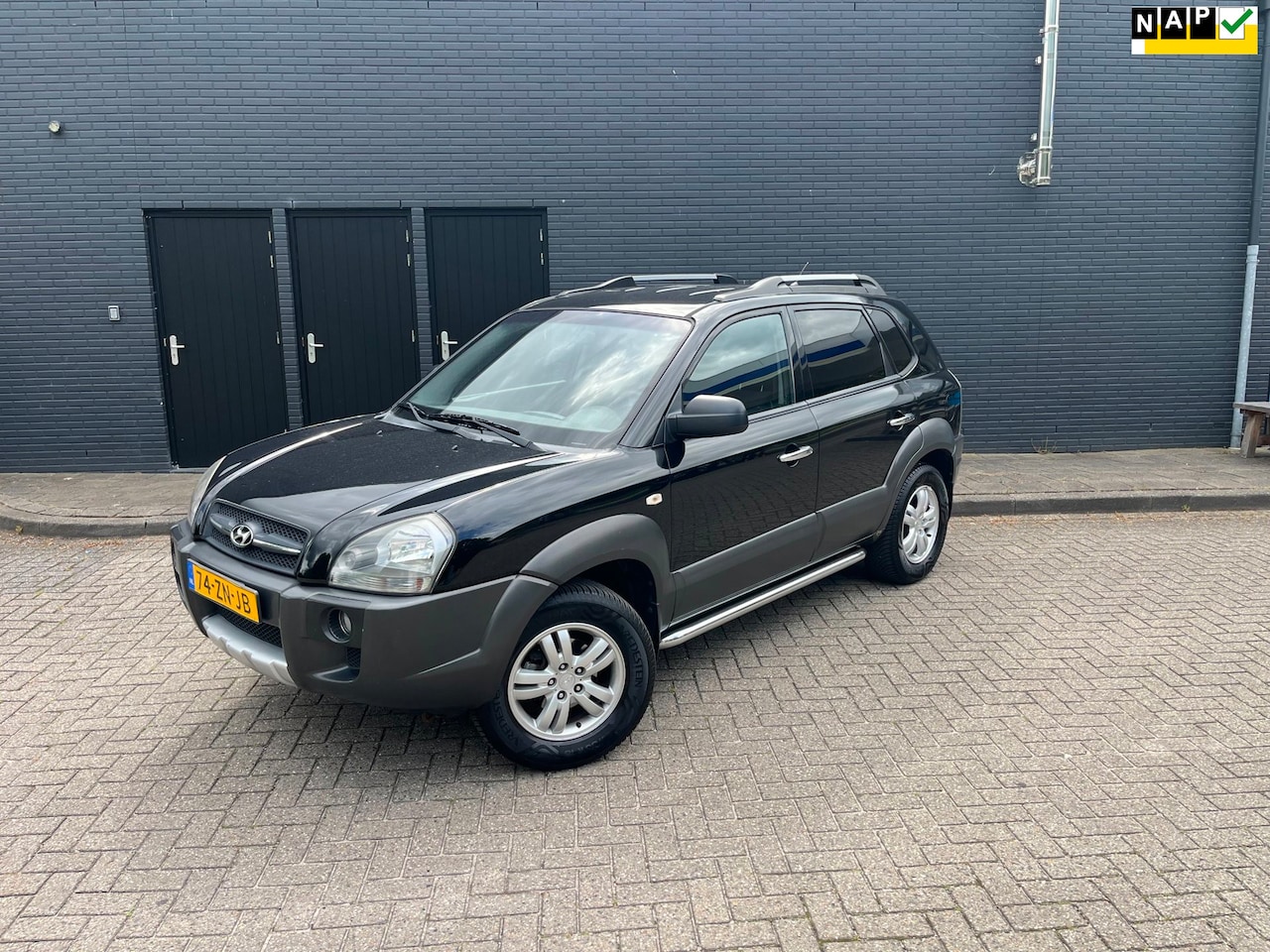 Hyundai Tucson - 2.0i Dynamic Cross Airco Trekhaak NAP - AutoWereld.nl