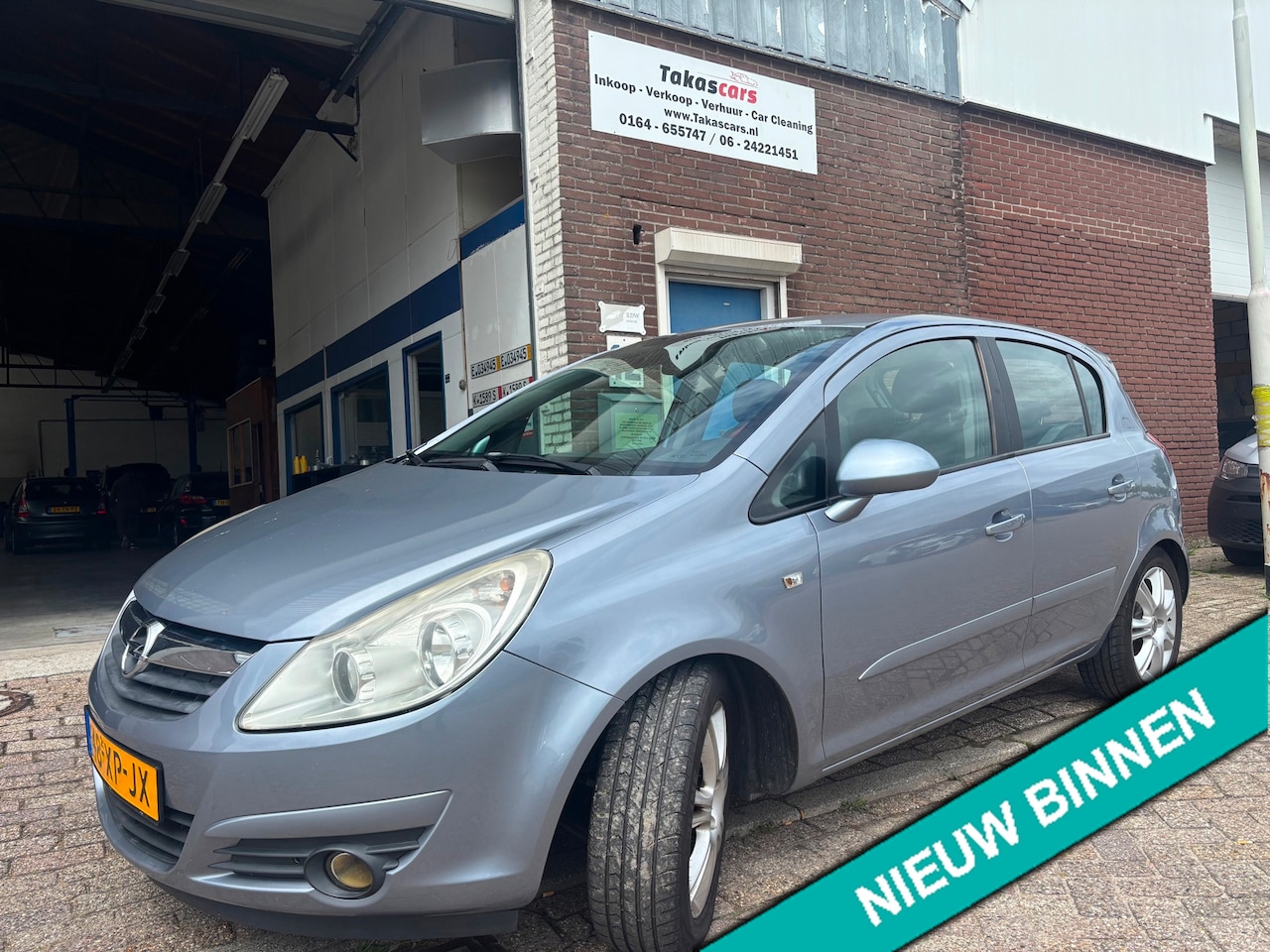Opel Corsa - 1.4-16V CosmoAUTOMAAT&AIRCO&JAAR APK &NAP - AutoWereld.nl