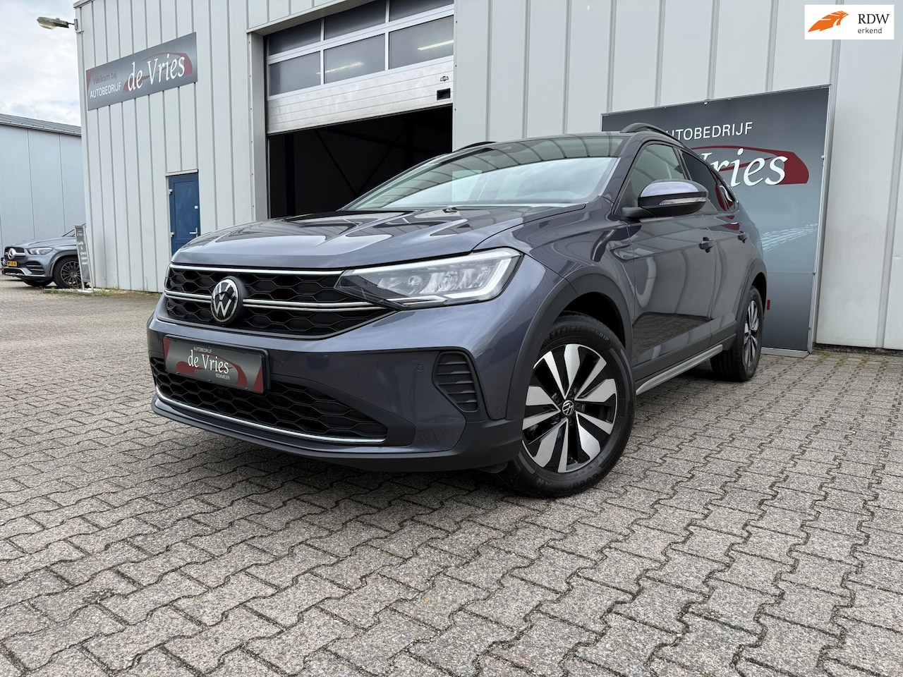 Volkswagen Taigo - 1.5 TSI Business / Airco / Navi / Stoelverw. / - AutoWereld.nl