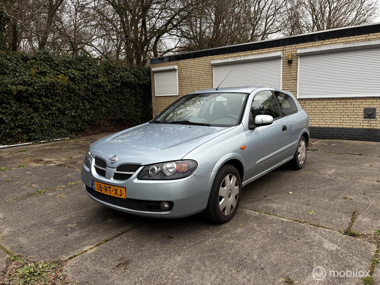 Nissan Almera - 1.5 Visia Clima - AutoWereld.nl