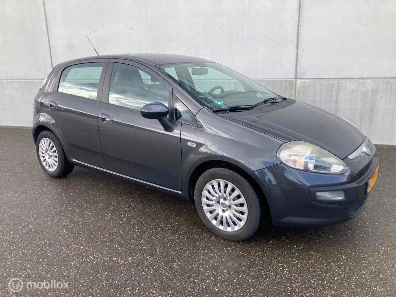 Fiat Punto Evo - 1.3 16V M-Jet Racing AIRCO EURO 5 - AutoWereld.nl