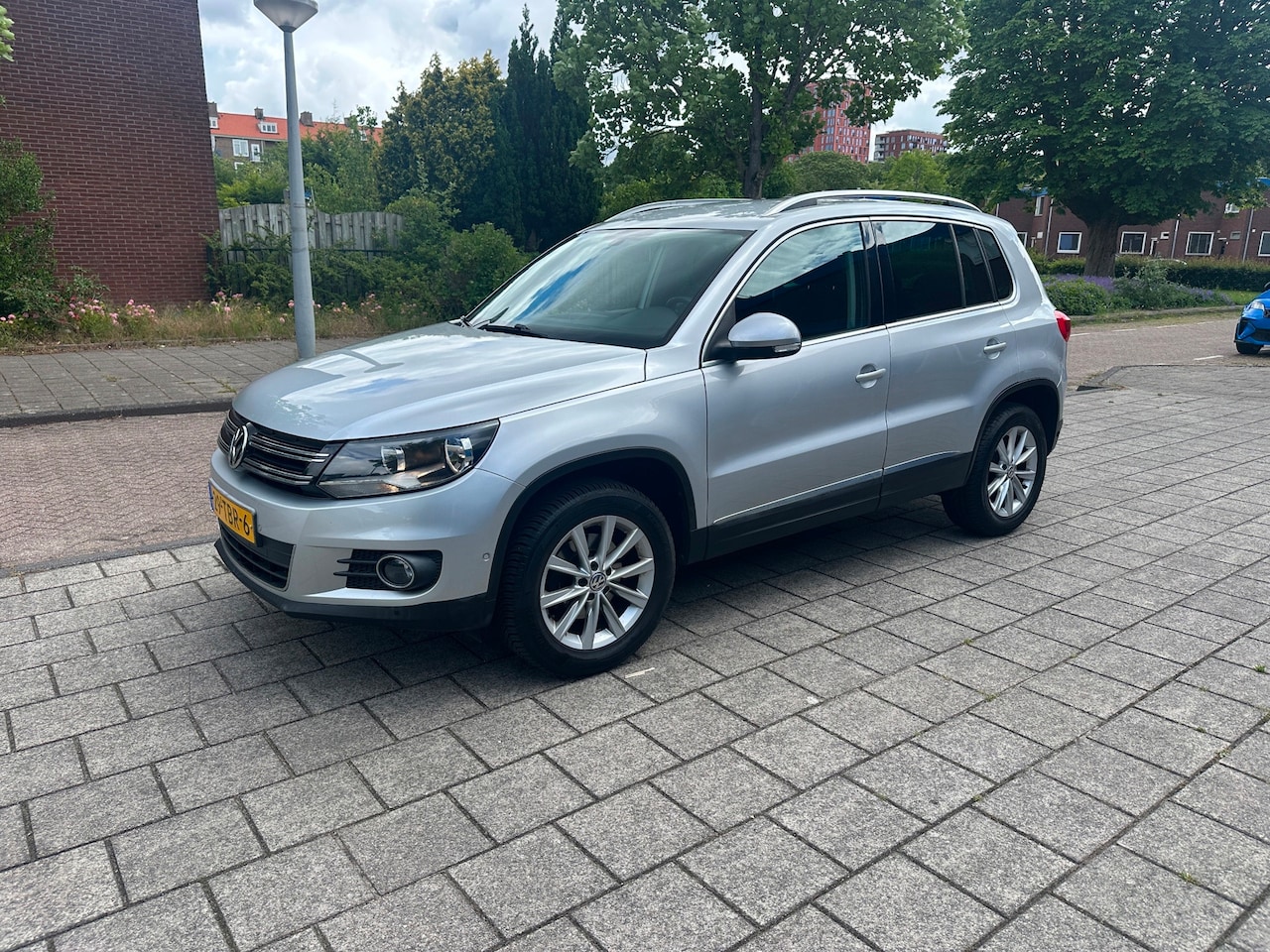 Volkswagen Tiguan - 1.4 TSI Sport&Style NAP Parkassist Cruise Alcantara - AutoWereld.nl