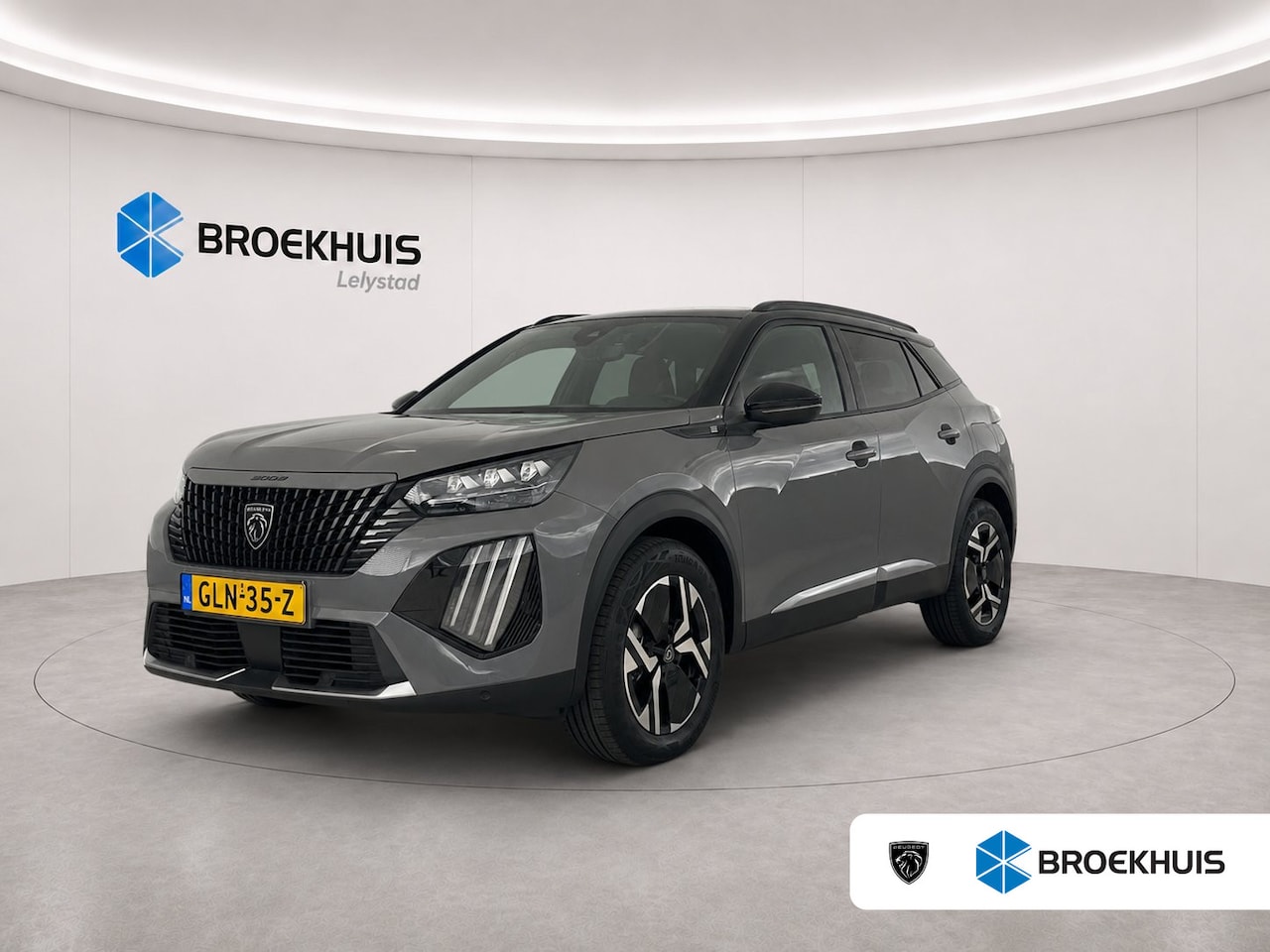Peugeot e-2008 - 54KWH 156PK GT PACK AUTOMAAT / NAVI / LEDER / CLIMA / LED / PDC / 17" LMV / KEYLESS / CAME - AutoWereld.nl