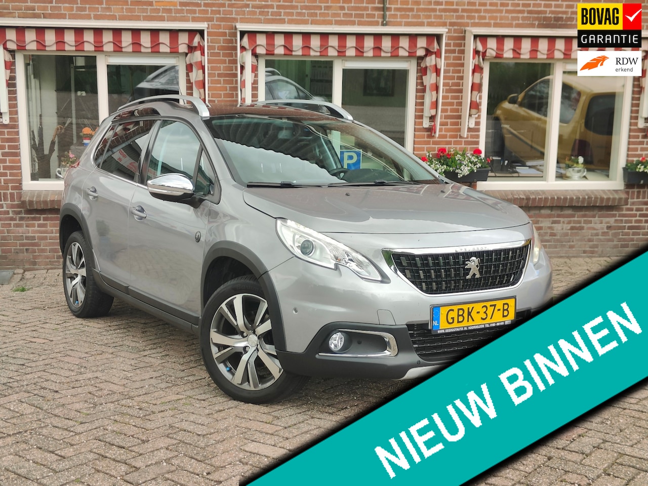 Peugeot 2008 - 1.2 PureTech GT-Line Aut, Clima Cruise Camara Pano - RIJKLAAR - - AutoWereld.nl