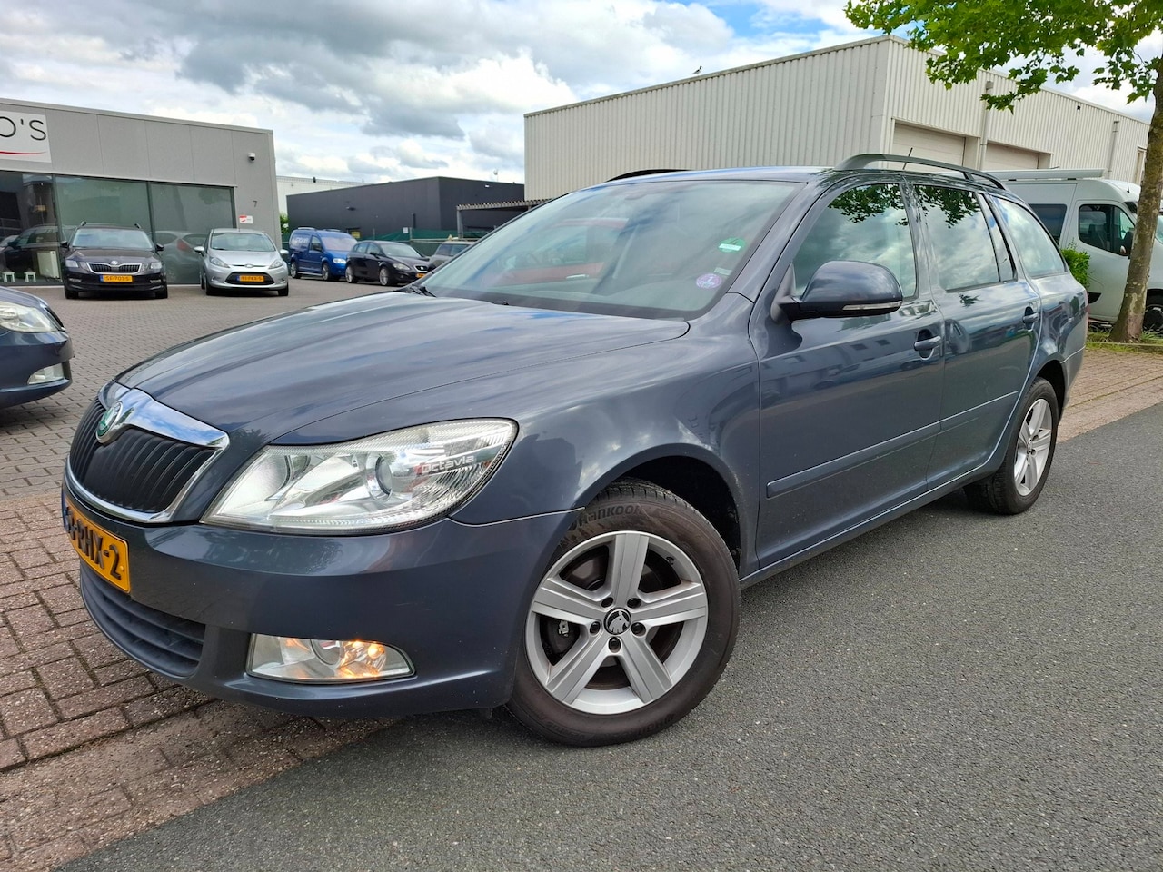 Skoda Octavia Combi - 1.2 TSI Ambition Business Line CLIMA/CRUISE/NAVI! - AutoWereld.nl