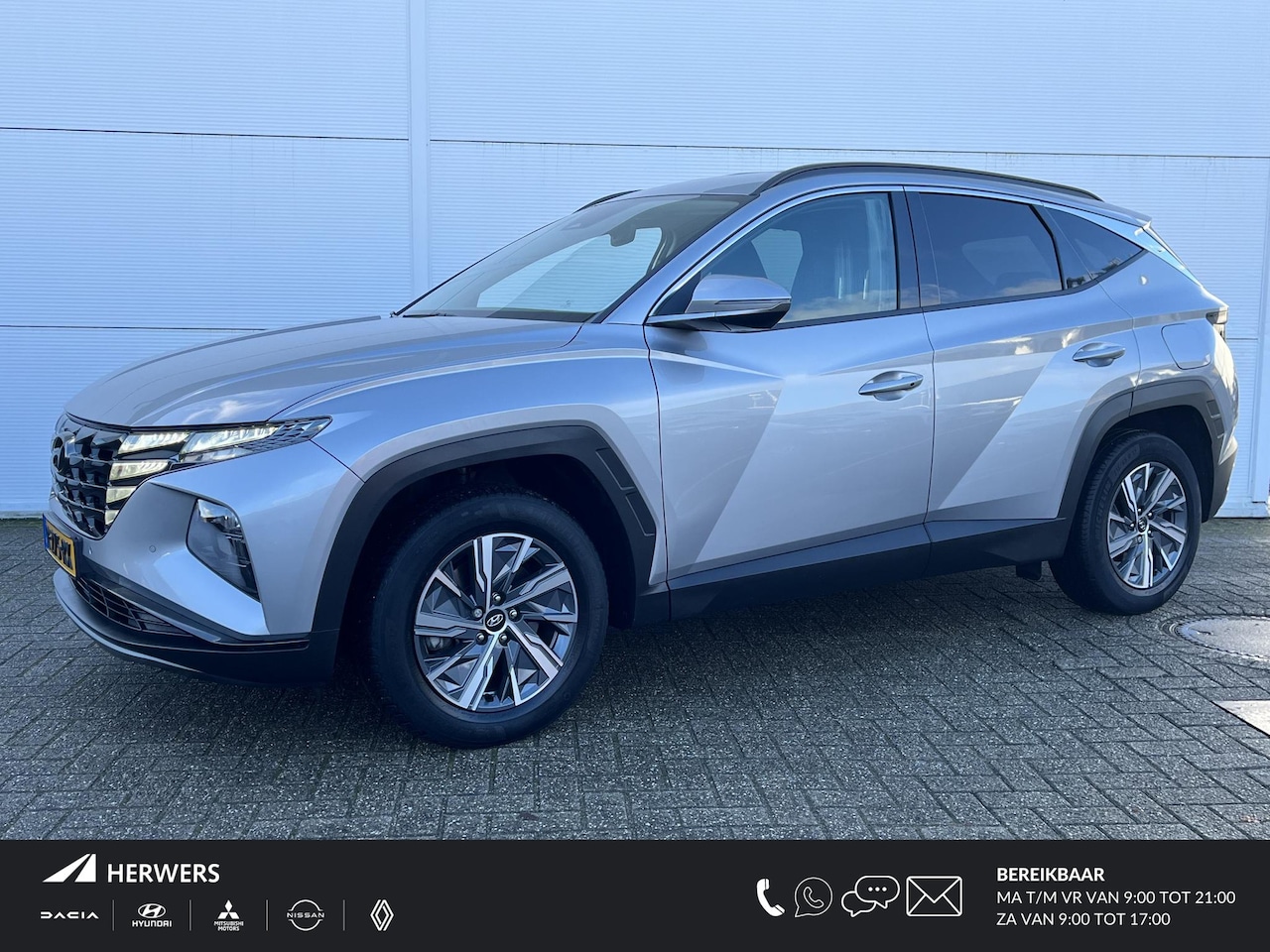 Hyundai Tucson - 1.6 T-GDI HEV Comfort / Navigatie / Climate Control (Airco) / Apple Carplay/Android Auto / - AutoWereld.nl