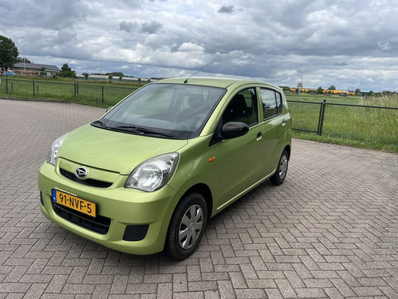 Daihatsu Cuore - 1.0 5D Airco Elektr pakket Apk - AutoWereld.nl