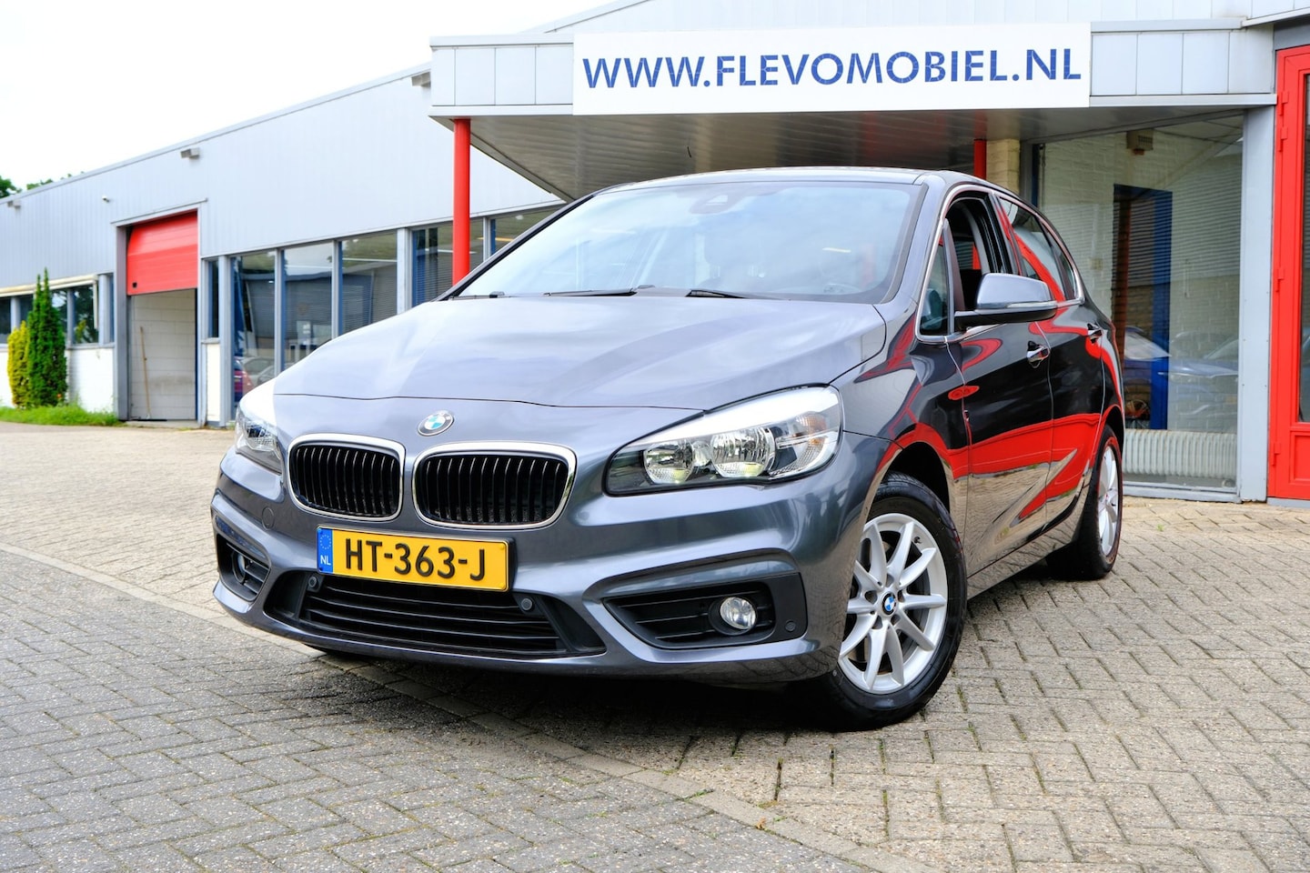 BMW 2-serie Active Tourer - 218i Essential Aut. *47.450km!* Navi|1e Eig!|Clima|PDC|LMV - AutoWereld.nl