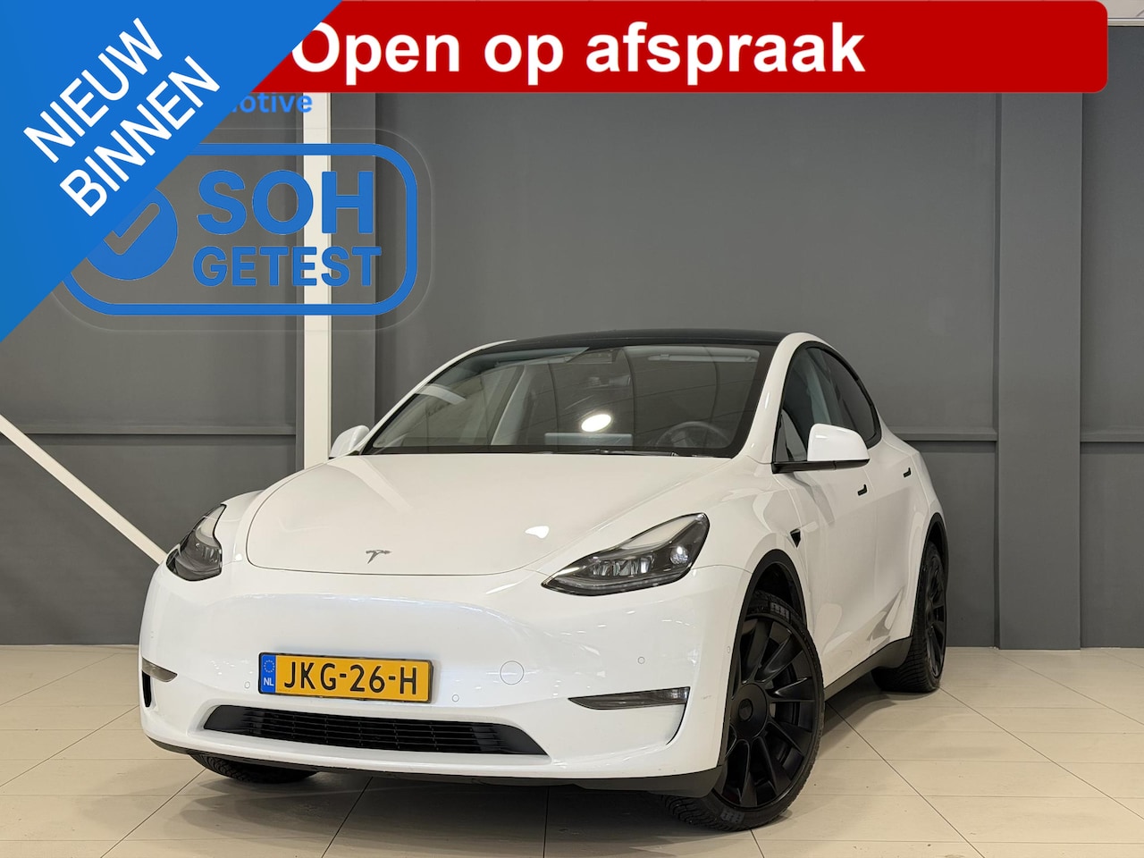 Tesla Model Y - Long Range RWD 75 kWh | SOH 92,4% | Hoge instap | 76.841 km | - AutoWereld.nl