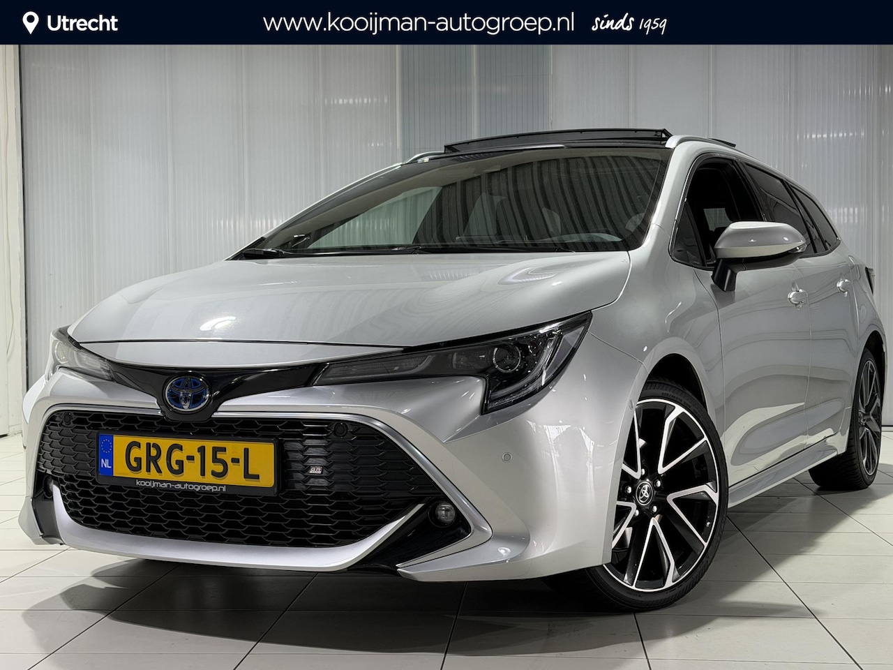 Toyota Corolla Touring Sports - 2.0 Hybrid Executive | GR Sport Pack | Panoramadak | Heads Up Display | Stoelverwarming V+ - AutoWereld.nl