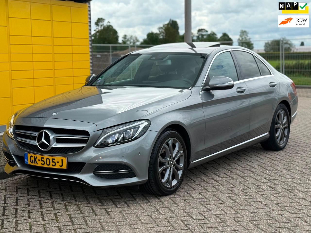 Mercedes-Benz C-klasse - 180 Ambition Bj 2015 Xenon Schuifdak Navi Half leer PDC - AutoWereld.nl