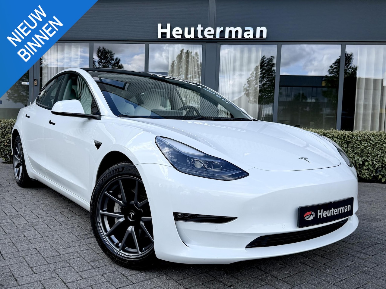 Tesla Model 3 - Long Range RWD Long Range AWD 75 kWh Pano/ Autopilot/ Wit Leder - AutoWereld.nl