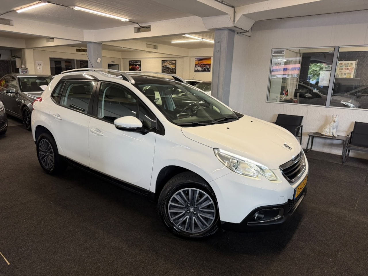 Peugeot 2008 - 1.2 VTi *NAP*PANO*NAVI*nette auto* - AutoWereld.nl
