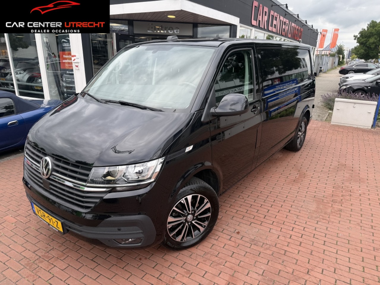 Volkswagen Transporter - 2.0 TDI L2H3 28 Bulli automaat airco navi trekhaak - AutoWereld.nl