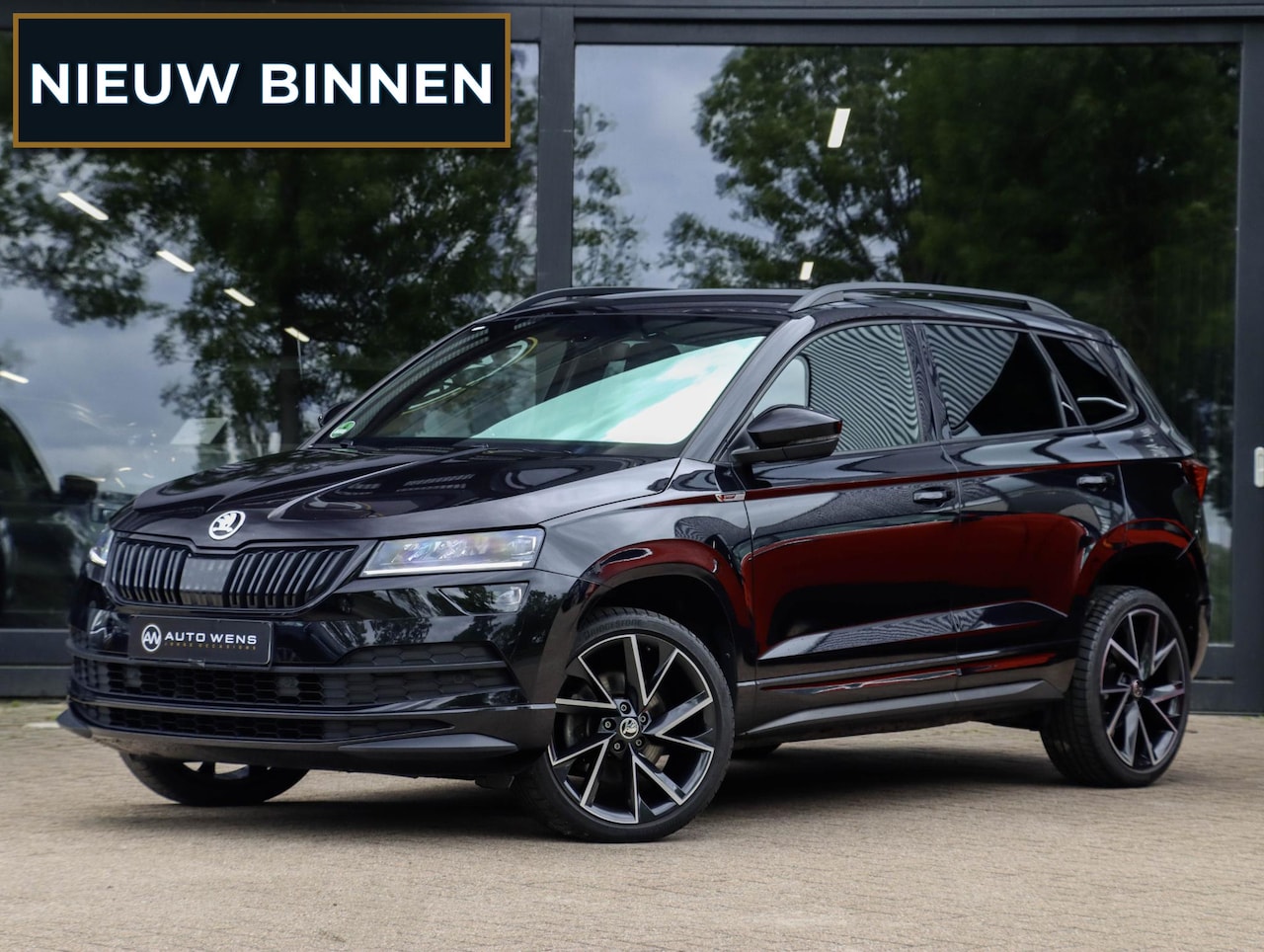 Skoda Karoq - 1.5 TSI ACT Sportline DSG Virtual Adapt. Cruise Navi Camera 19 inch - AutoWereld.nl