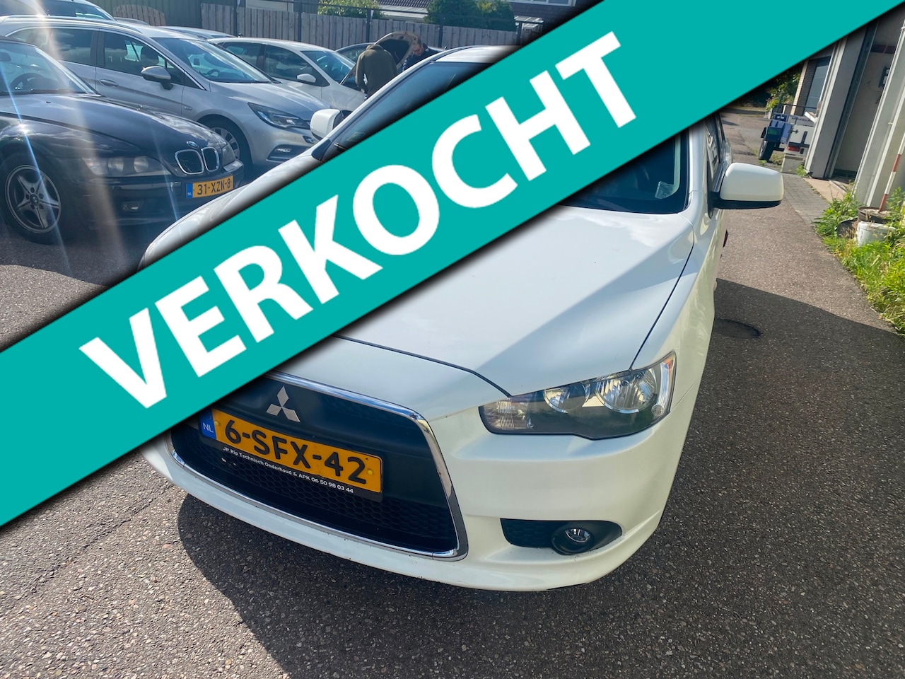 Mitsubishi Lancer Sportback - 1.6 Edition Two 1.6 Edition Two - AutoWereld.nl