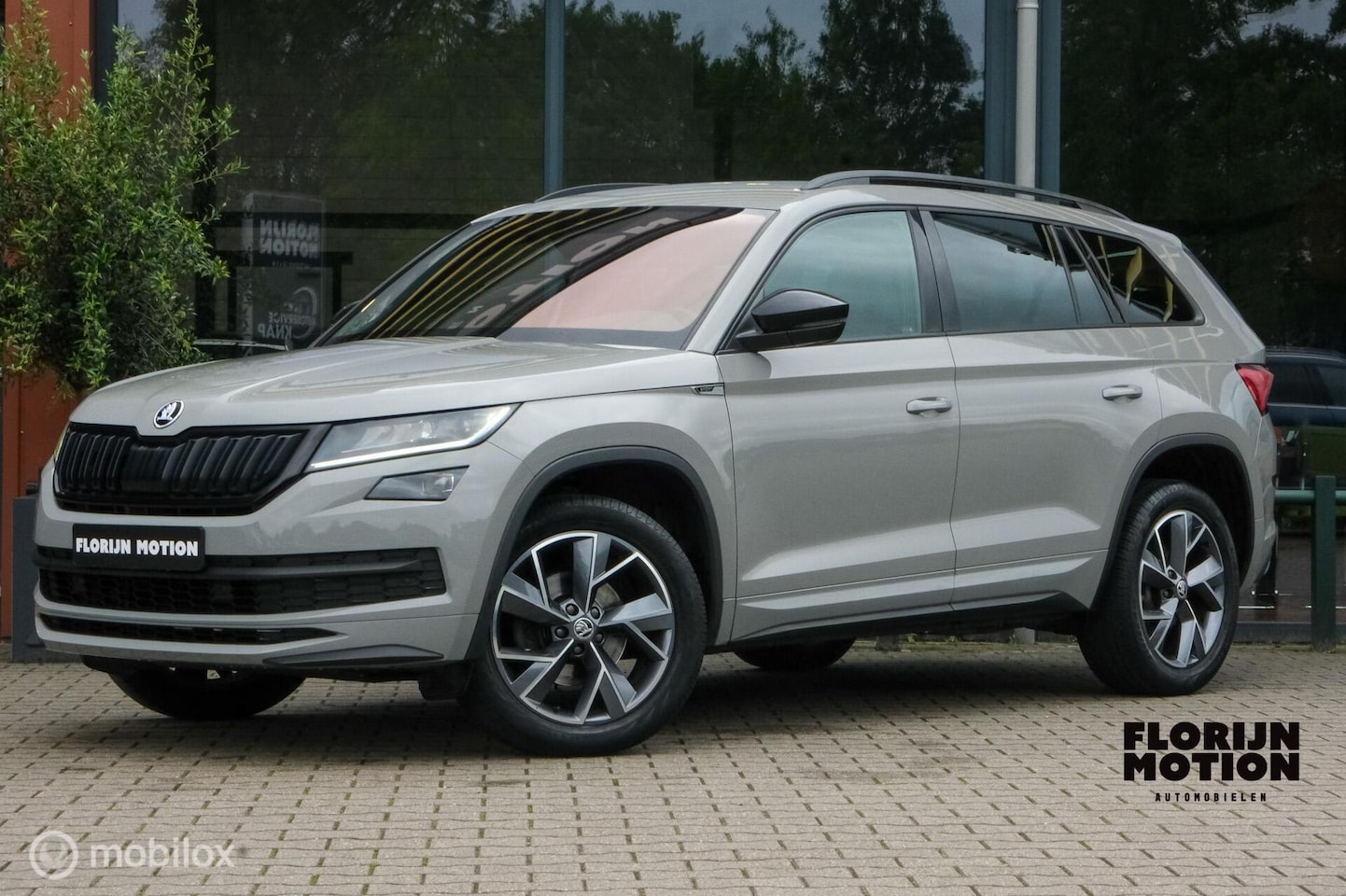 Skoda Kodiaq - 1.5 TSI Sportline Business | DAB+ | Sfeerverlichting | ACC | Canton Audio | Steelgrey | Al - AutoWereld.nl