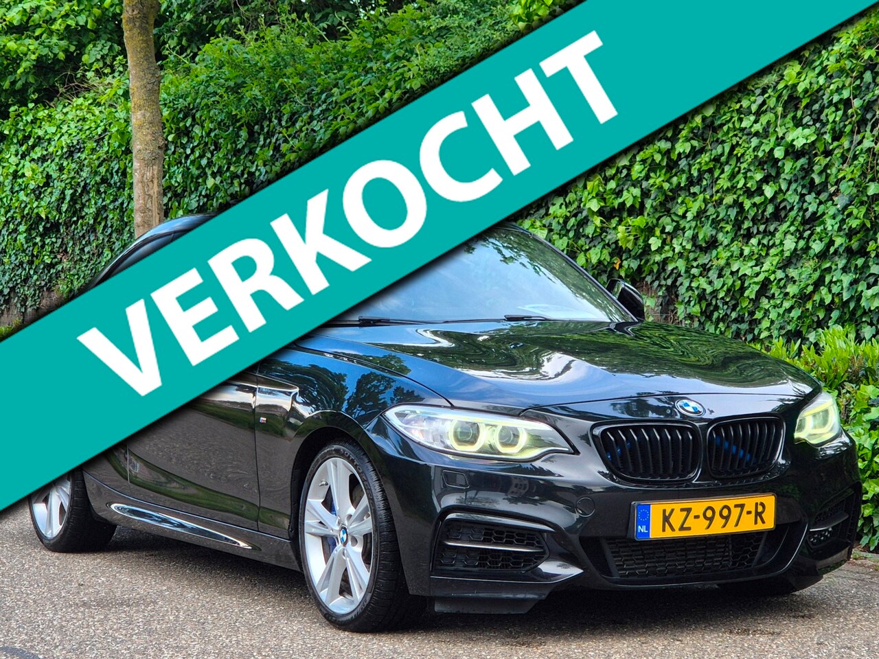 BMW 2-serie Coupé - M2 M235i High Executive Schuifdak GR Navi H&K Stuurverwarming NAP - AutoWereld.nl
