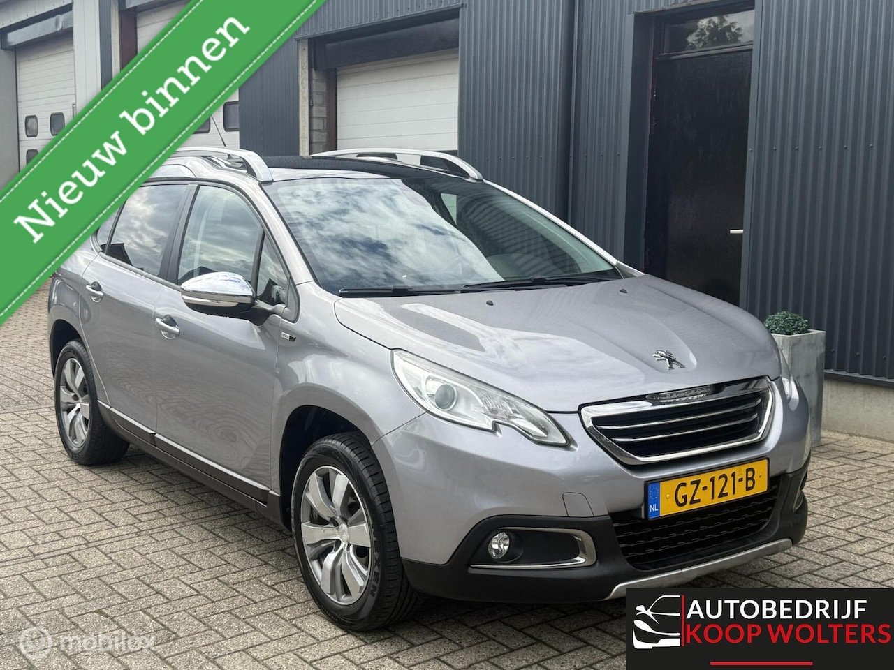 Peugeot 2008 - 1.2 Allure Airco Pano Trekhaak AUT - AutoWereld.nl
