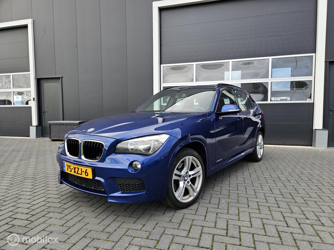 BMW X1 - 20i M-Pakket Le Mans Blue 184PK | Trekhaak | Dealer - AutoWereld.nl