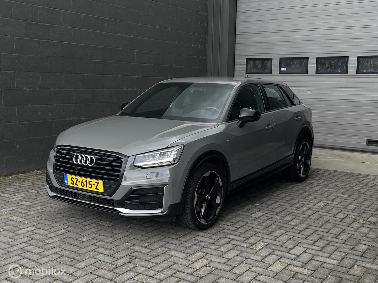 Audi Q2 - 1.4 TFSI CoD Sport Edition #1 S-line | Nardo Grey | Trekhaak | All-season | LED | - AutoWereld.nl