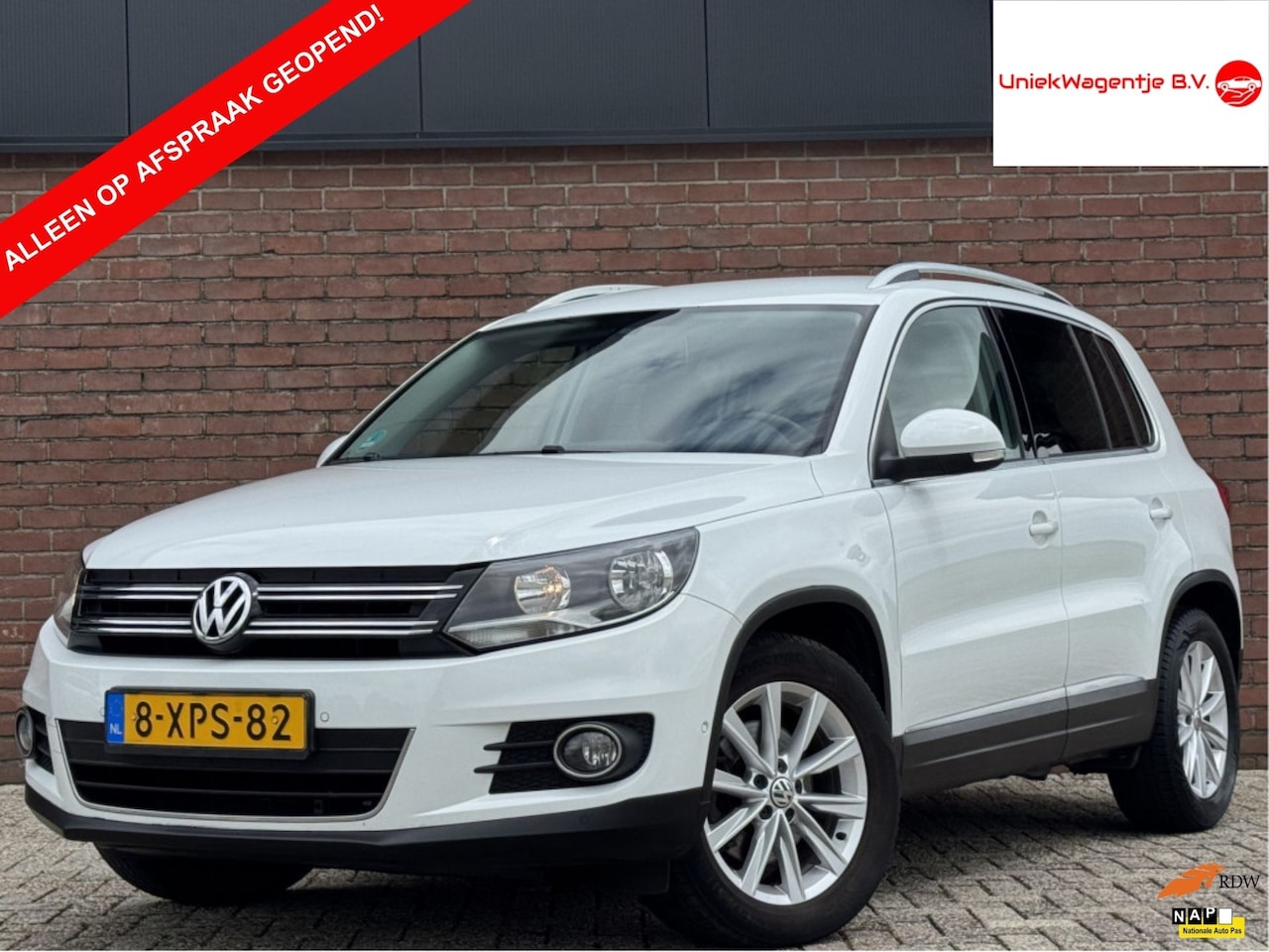Volkswagen Tiguan - 1.4 TSI SPORT&STYLE | NL-AUTO! | TREKHAAK! - AutoWereld.nl