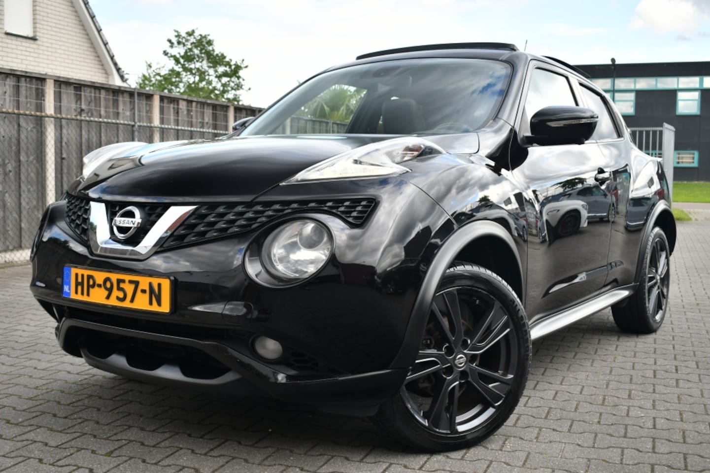 Nissan Juke - 1.2 Tekna Pano|Leder|Camera|DAB|18" - AutoWereld.nl