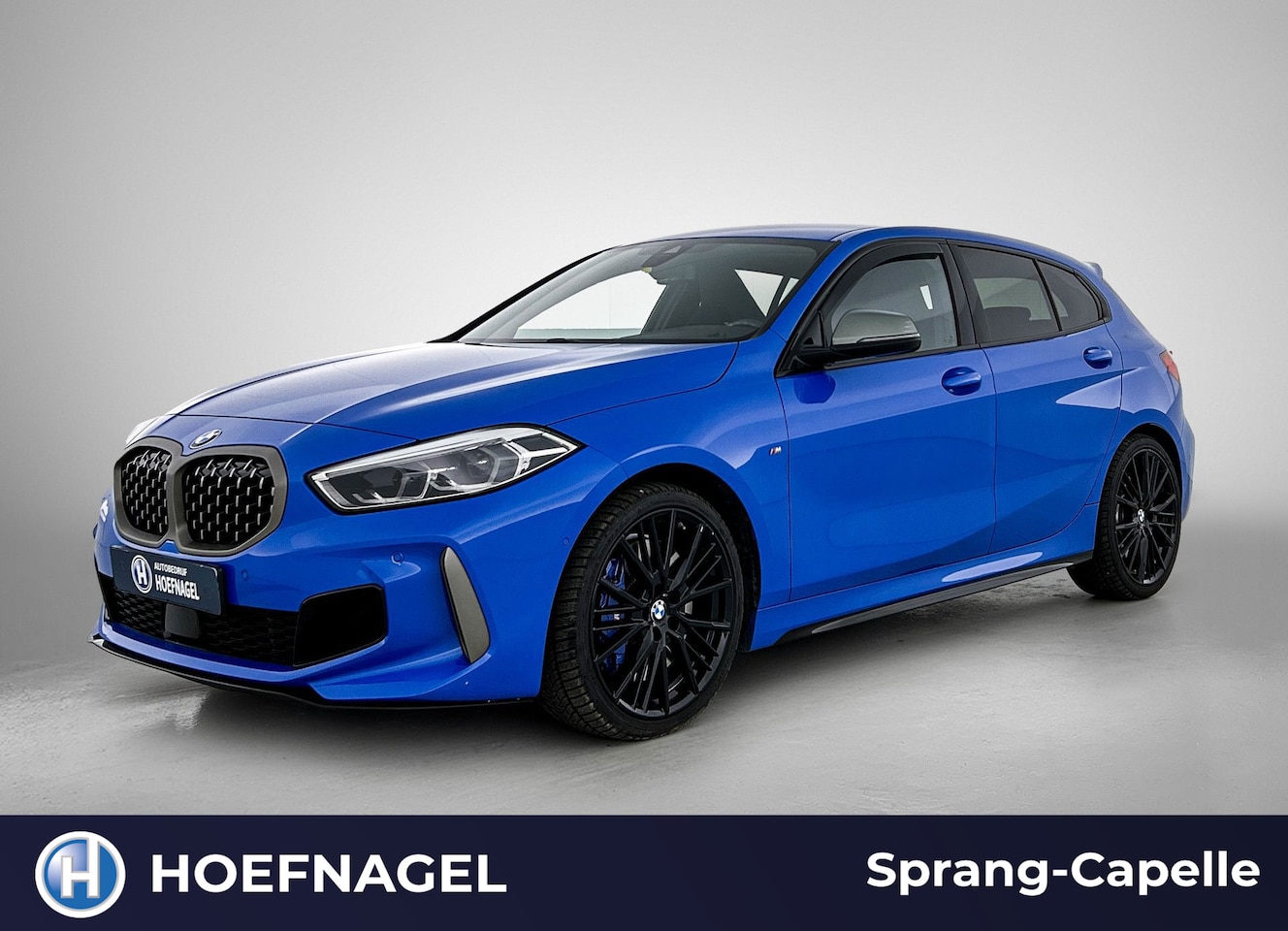 BMW 1-serie - M135i xDrive | Camera | Navi | Cruise Control | CarPlay - AutoWereld.nl