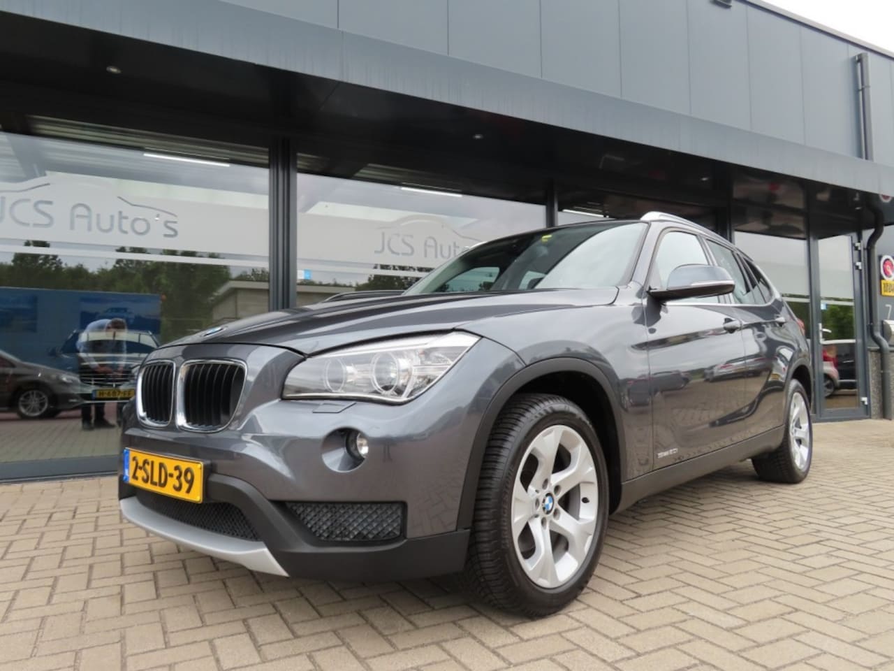 BMW X1 - SDrive Chrome Line Aut Ecc Navi Trekhaak 2013 - AutoWereld.nl