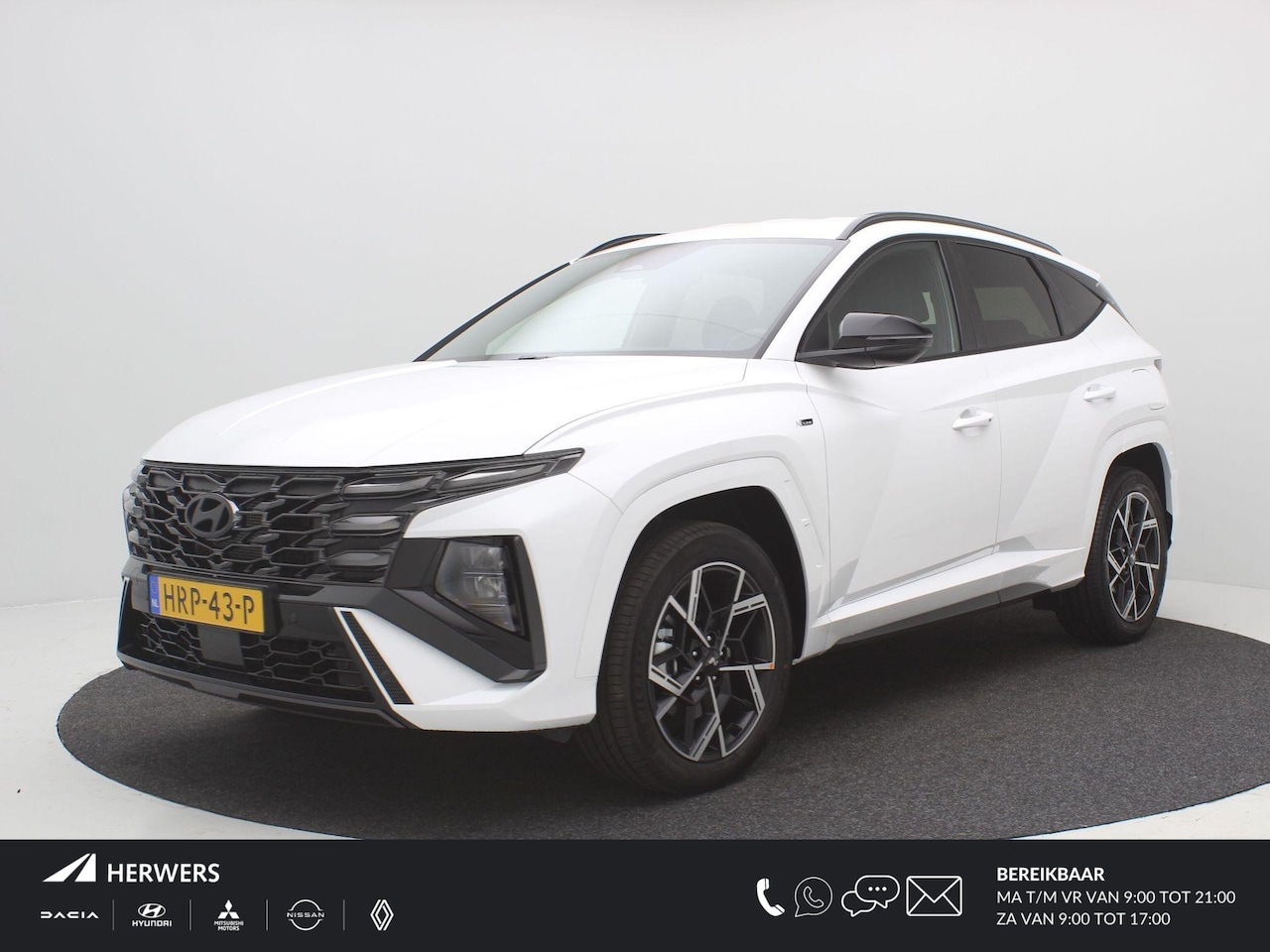 Hyundai Tucson - 1.6 T-GDI PHEV N Line Edition / Navigatie / Leer-Alcantara bekleding met rode stiksel / 19 - AutoWereld.nl