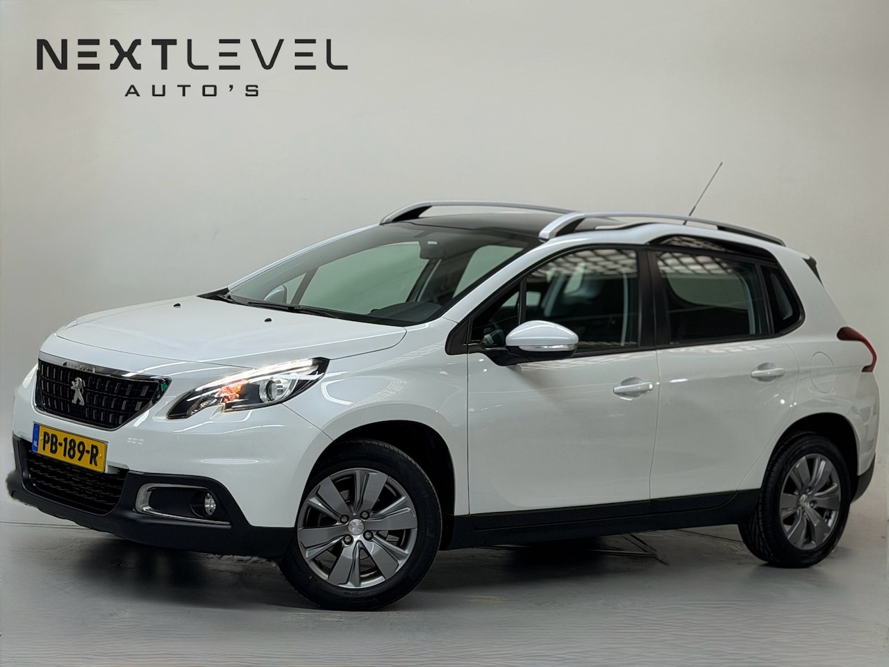 Peugeot 2008 - 1.2 PureTech Allure Automaat Pano Cruise - AutoWereld.nl