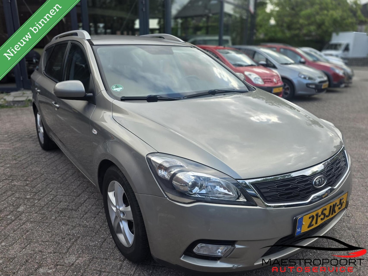 Kia Cee'd Sporty Wagon - 1.4 CVVT Navigator Plus Pack 1.4 CVVT Navigator Plus Pack - AutoWereld.nl