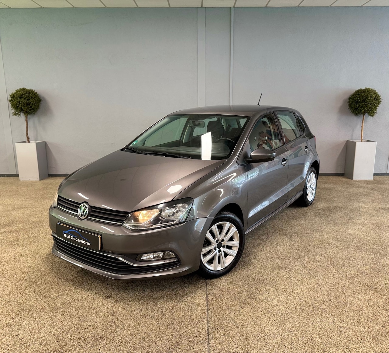 Volkswagen Polo - 1.2 TSI BlueMotion Highline - Bluetooth - Cruise - Trekhaak - AutoWereld.nl