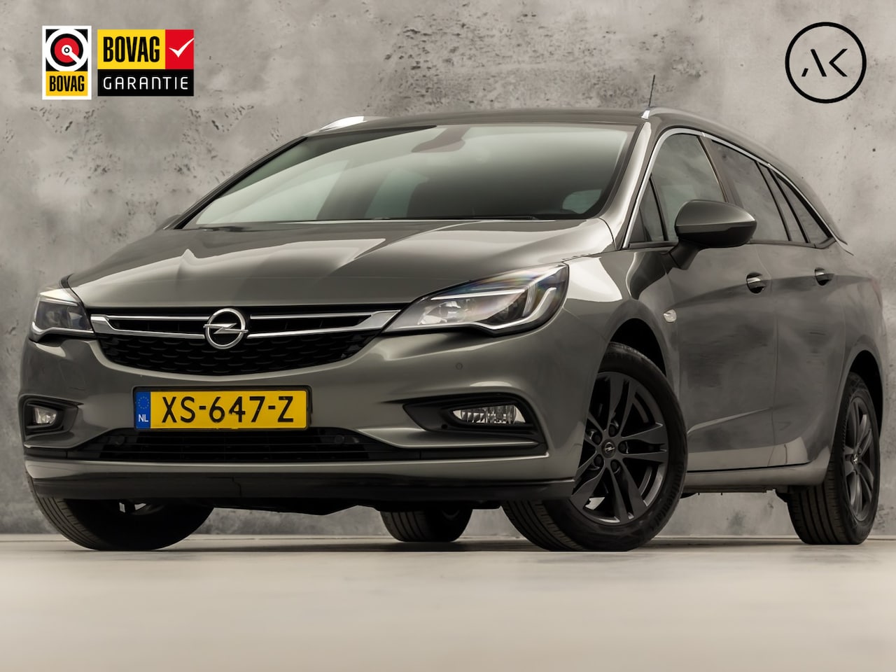 Opel Astra Sports Tourer - 1.0 Turbo Sport (APPLE CARPLAY, GROOT NAVI, CLIMATE, GETINT GLAS, SPORTSTOELEN, PARKEERSEN - AutoWereld.nl