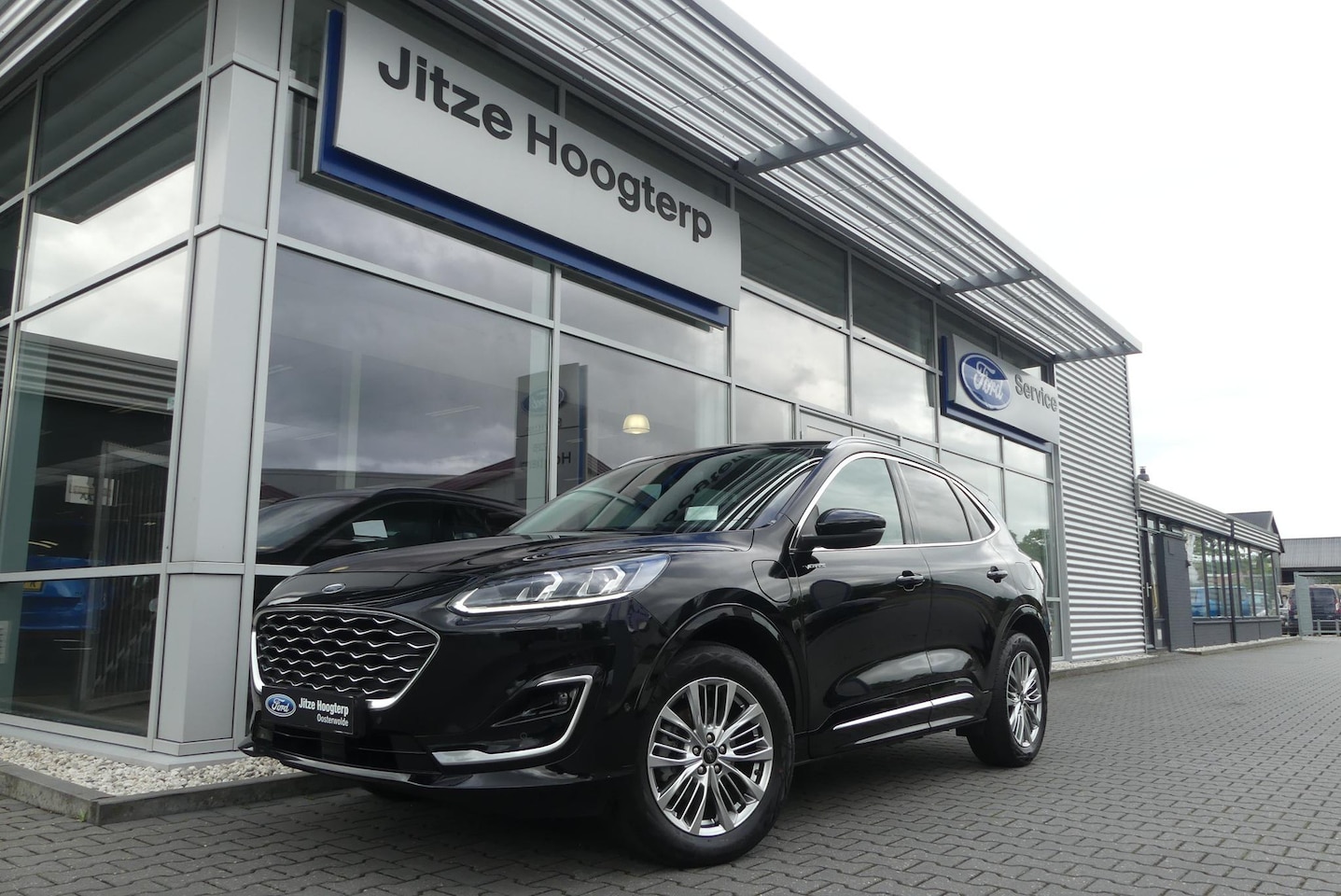 Ford Kuga - 2.5 PHEV Vignale HUD, WINTER PACK, MEMORY, ADAPT. CRUISE, CLIMA, NAVI, CAMERA V&A, PDC V&A - AutoWereld.nl