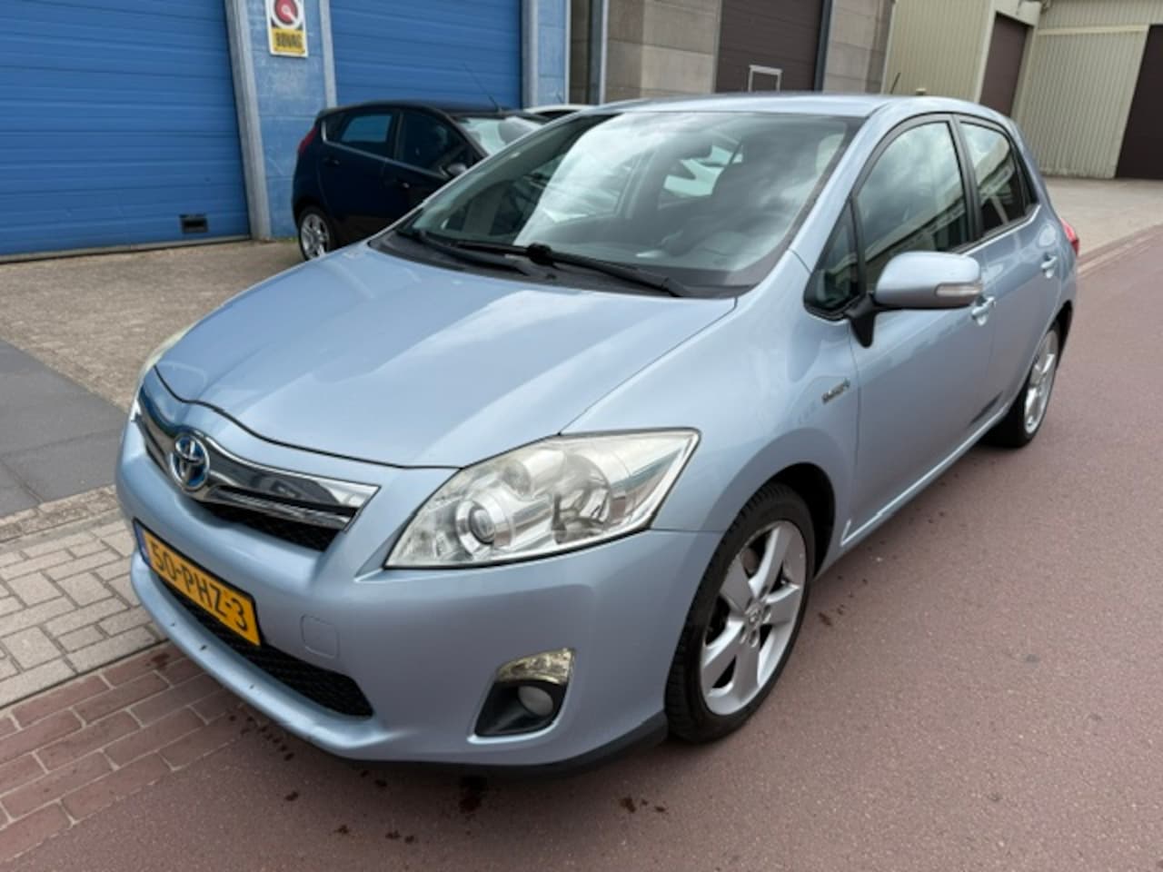 Toyota Auris - 1.8 Full Hybrid Executive 2011 NAP + Boekjes Meest luxe uitvoering met koude airco, Navi, - AutoWereld.nl