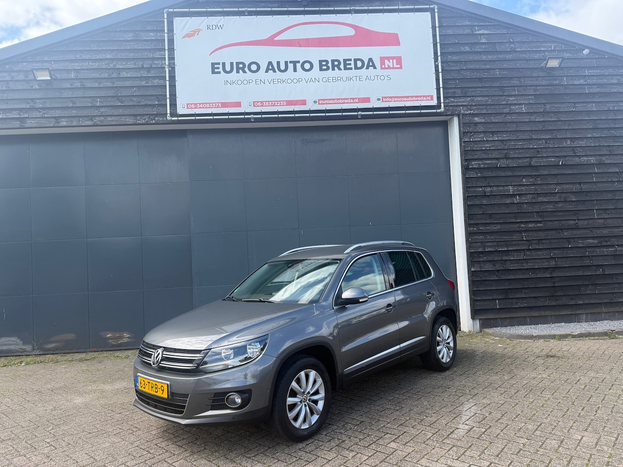 Volkswagen Tiguan - 1.4 TSI Sport&Style - AutoWereld.nl