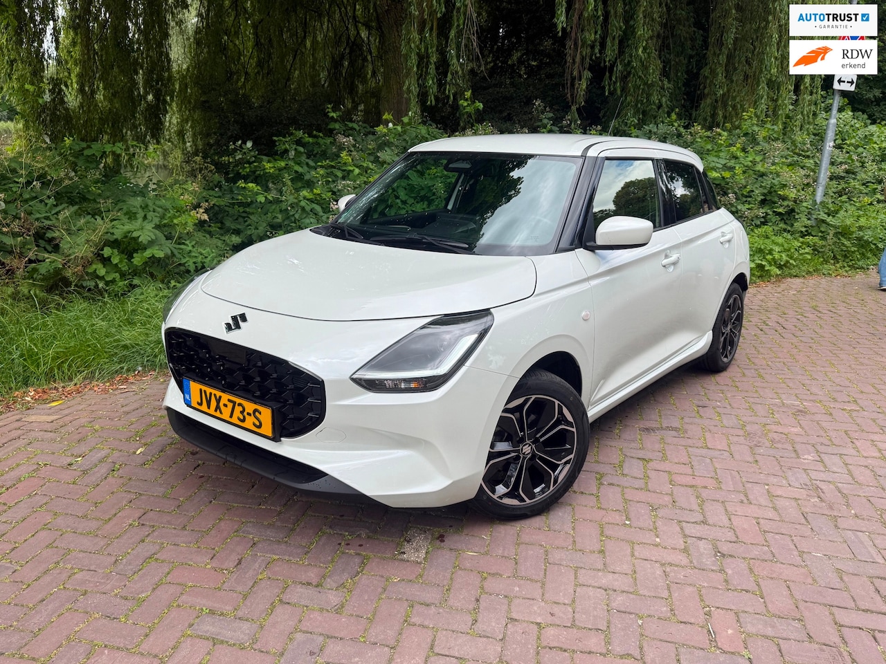 Suzuki Swift - 1.2 Comfort Smart Hybrid 1 Eig. b.j.12-2024,5100 KM,Navi ,Camera,PDC - AutoWereld.nl