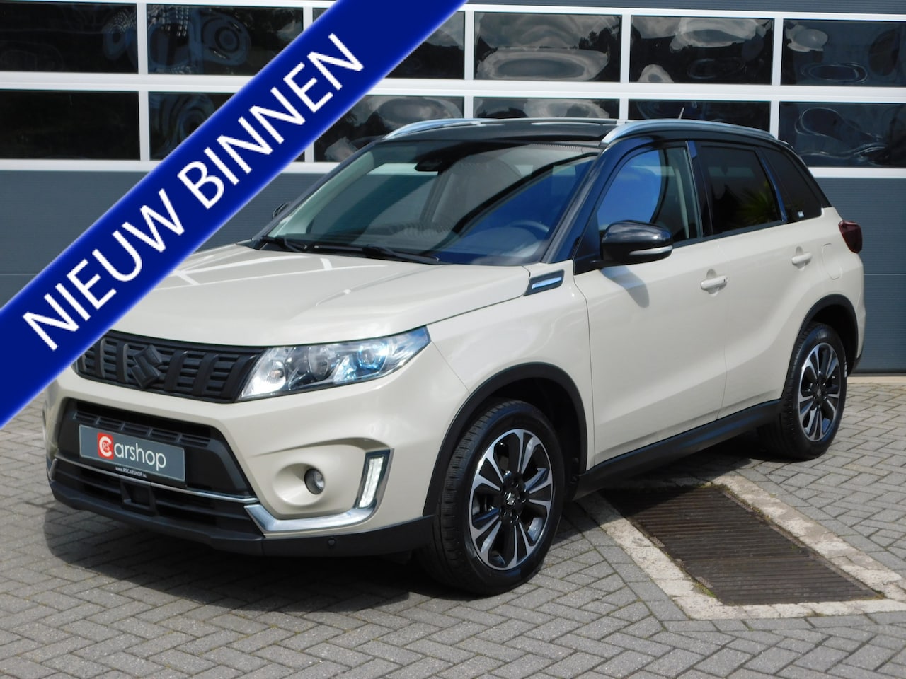 Suzuki Vitara - 1.4 Boosterjet Style Smart Hybrid 1.4 Boosterjet Style Smart Hybrid, met open dak, carplay - AutoWereld.nl