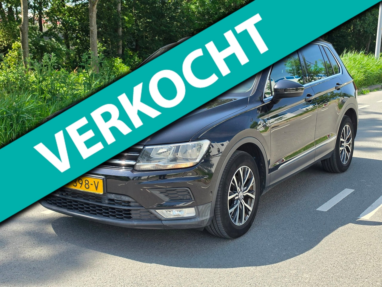 Volkswagen Tiguan - 2.0 TDI Comfortline Business / AIRCO / DSG - AutoWereld.nl