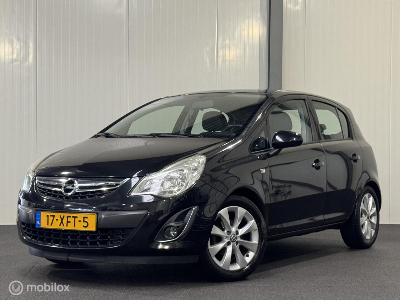 Opel Corsa - 1.2-16V Cosmo 5-drs [ NAP cruise airco LM ] - AutoWereld.nl