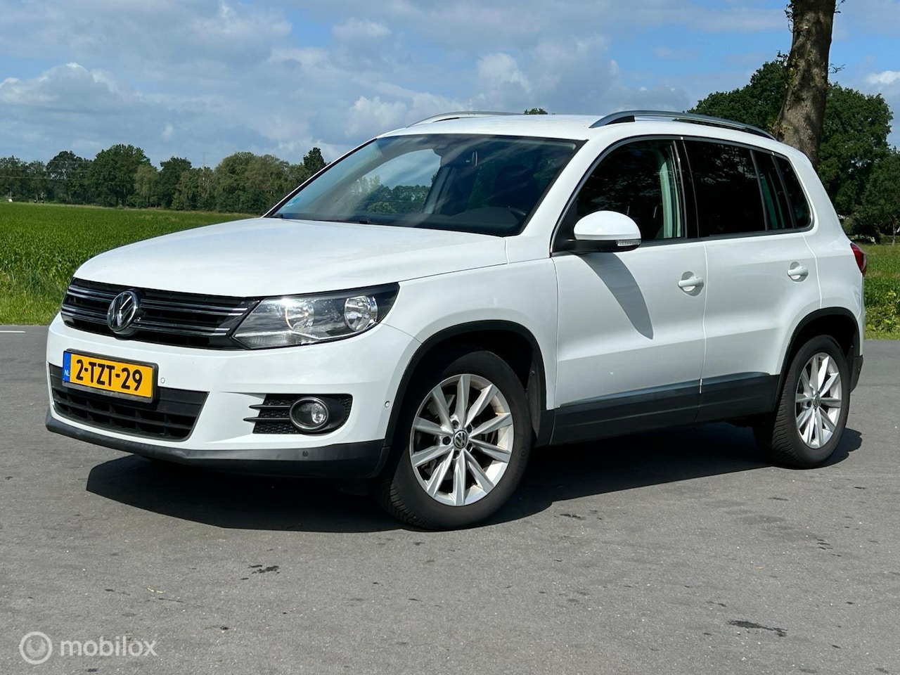 Volkswagen Tiguan - 1.4 TSI Sport&Style - AutoWereld.nl