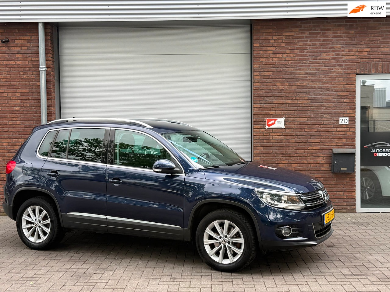 Volkswagen Tiguan - 1.4 TSI Comfort&Design 4Motion|NIEUWE APK|AIRCO - AutoWereld.nl