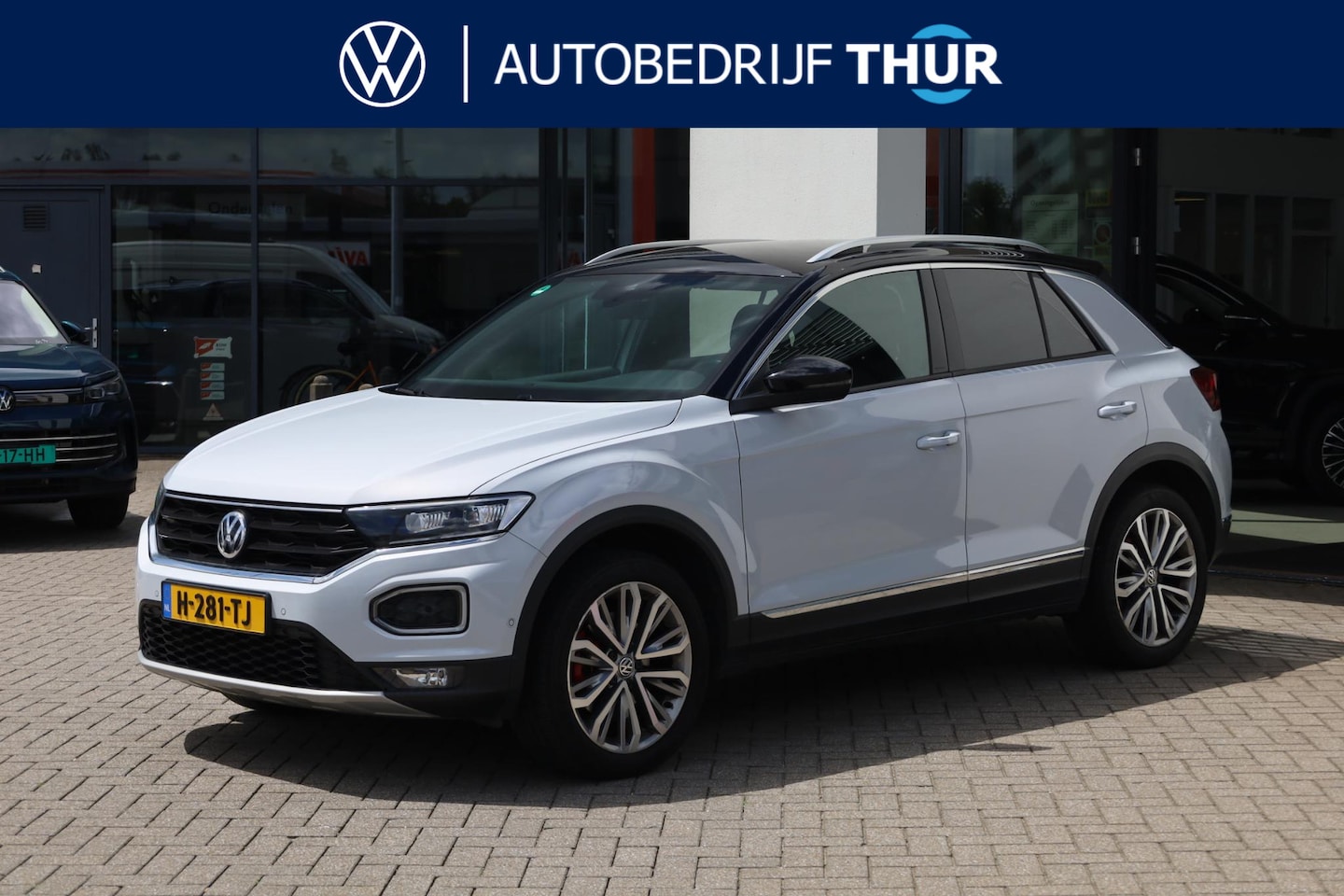Volkswagen T-Roc - 1.5 TSI Sport trekhaak, 18" LMV, LED, achteruitrijcamera, navigatie, zwarte hemel + zwart - AutoWereld.nl