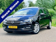 Opel Astra Sports Tourer - 1.0 Business+ / Clima / Navi / Svhuifdak / CC / Verwarmde Stuur en Voorstoelen / PDC / 2de