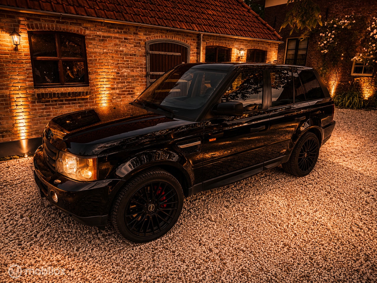 Land Rover Range Rover Sport - 4.2 V8 Supercharged 4.2 V8 Supercharged - AutoWereld.nl
