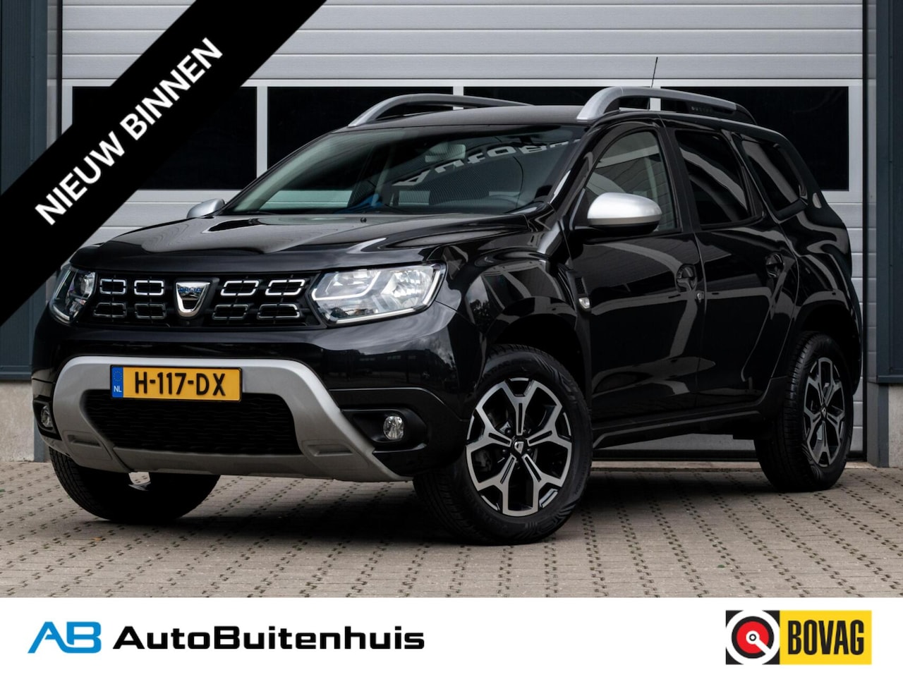Dacia Duster - 1.2 TCe Prestige|STOELVERW.|CAMERA|CARPLAY|CLIMATE|SIDE ASSIST - AutoWereld.nl