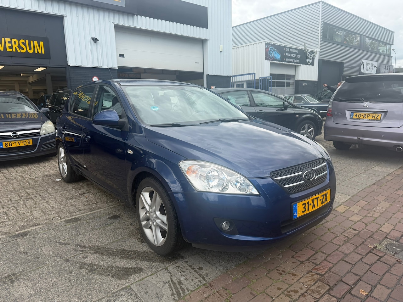 Kia Cee'd - 1.6 X-ecutive clima - AutoWereld.nl
