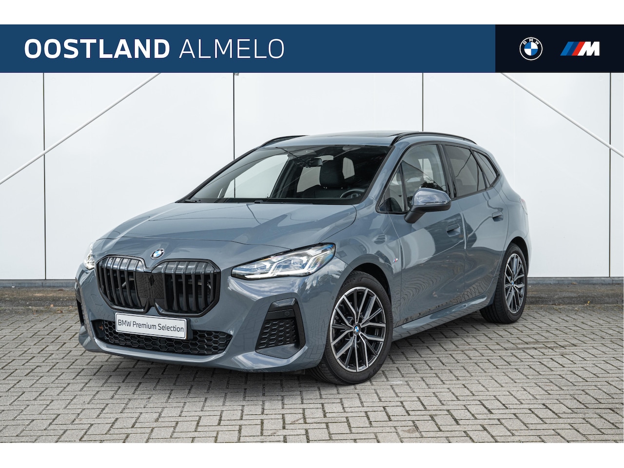 BMW 2-serie Active Tourer - 218i M Sport Automaat / Trekhaak / Panoramadak / Sportstoelen / Comfort Access / Achteruit - AutoWereld.nl